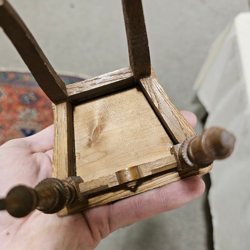 46 - A set of early 20th century oak dolls furniture, dresser, upholstered sofa and two chairs, dresser h... 