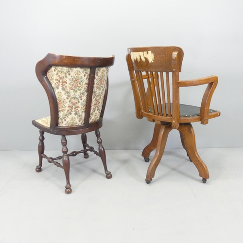 2715 - An antique oak captain's swivel desk chair and a mahogany and upholstered wingback side chair (2).