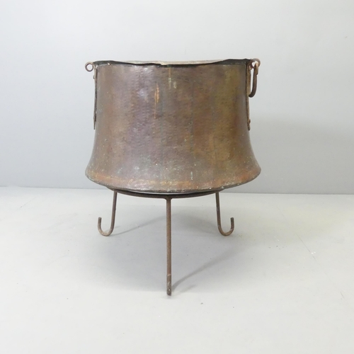 2725 - An antique copper copper on stand, 57x66cm.