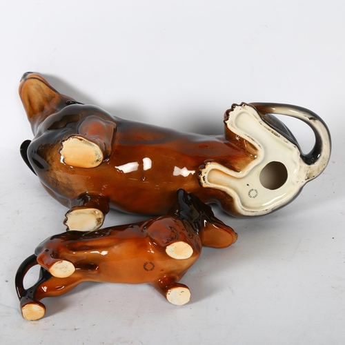 110 - BESWICK - 2 glazed Dachshunds, largest 38cm, smaller 23cm