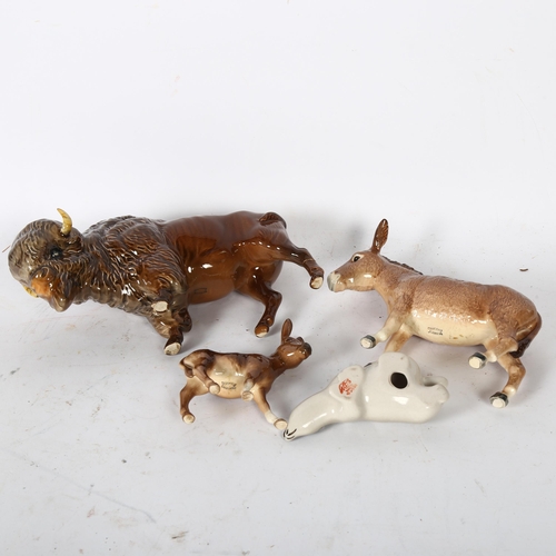 111 - A group of 3 Beswick animals, including a bison, a donkey, and a foal, and a Russian badger