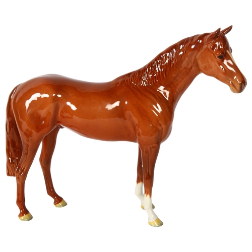 112 - A large Beswick model of a chestnut horse, H29cm