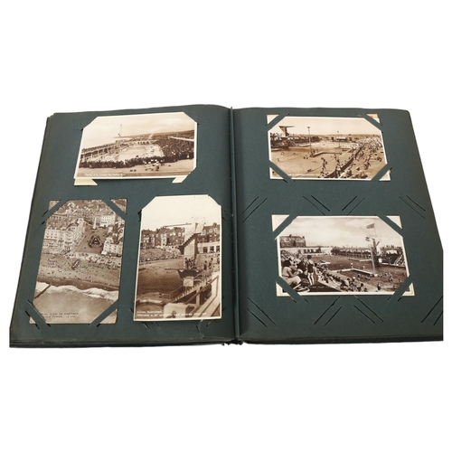 134 - An album of early black and white and coloured postcards, depicting Hastings and St Leonards, includ... 