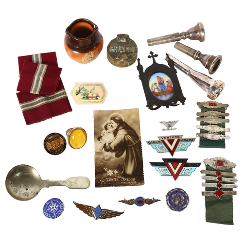 141 - A group of various items, including a miniature Doulton jug, a silver nurse's badge, Pratt's bronze ... 