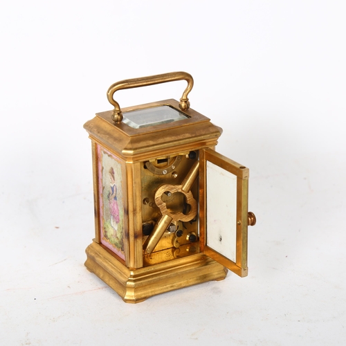 154 - A miniature modern brass-cased carriage clock, with painted ceramic panels, height not including the... 