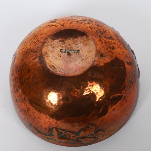 2 - NEWLYN - an Art Nouveau hammered copper rose bowl, stylised repousse decoration, with an inset pierc... 