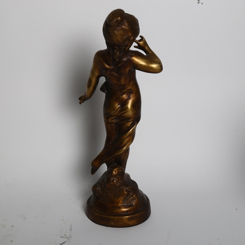 28 - A patinated brass figurine, H34cm