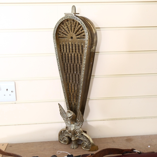 41 - A Vintage phoenix design brass fan fire screen, overall width 94cm