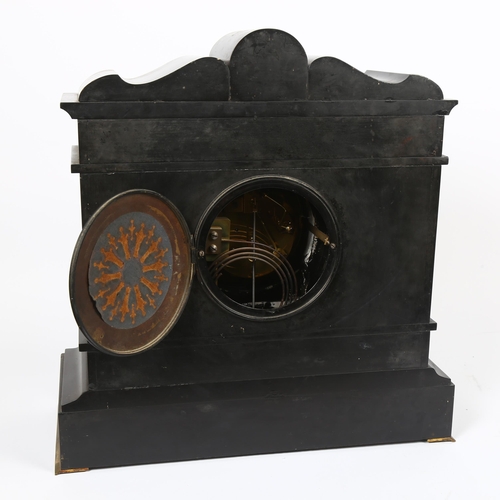 5 - A Victorian architectural black slate and gilded mantel clock, 8-day movement striking in a gong, wi... 