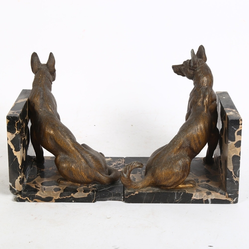 184 - A pair of German Shepherd dog sculptural spelter bookends, on marble bases, H18cm, L15cm, D11cm (of ... 