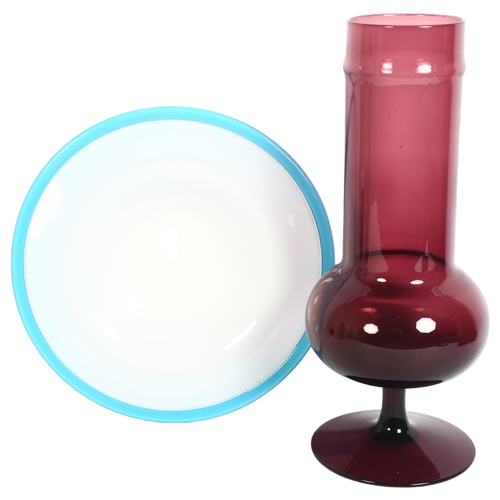 193 - EMPOLI - a mid-century Italian aubergine glass stemmed vase, in the manner of Gio Ponti, H36cm, and ... 