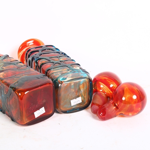 199 - 2 orange Mdina glass bottle vases and stoppers, with trailed decoration, both signed Mdina to base, ... 