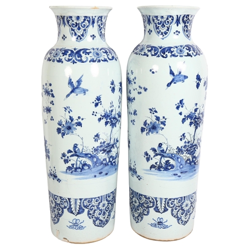 205 - A pair of Chinese blue and white porcelain sleeve vases, with floral and peacock decoration, H51cm