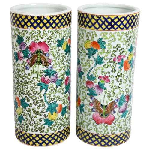 206 - A pair of 20th century Chinese porcelain cylinder vases, with floral and insect decoration, H28cm