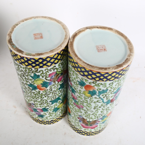 206 - A pair of 20th century Chinese porcelain cylinder vases, with floral and insect decoration, H28cm