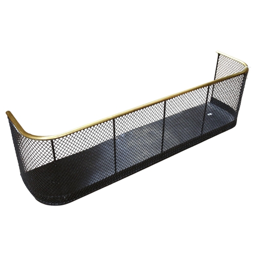 218 - A Victorian polished steel and brass nursery fender, with pierced mesh design, L108cm, D25cm