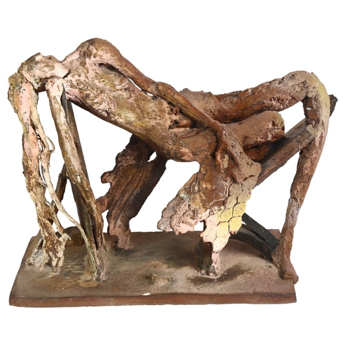 220 - An Art pottery stylised sculpture of a reclining figure, H26cm, an Art pottery vase of stylised form... 