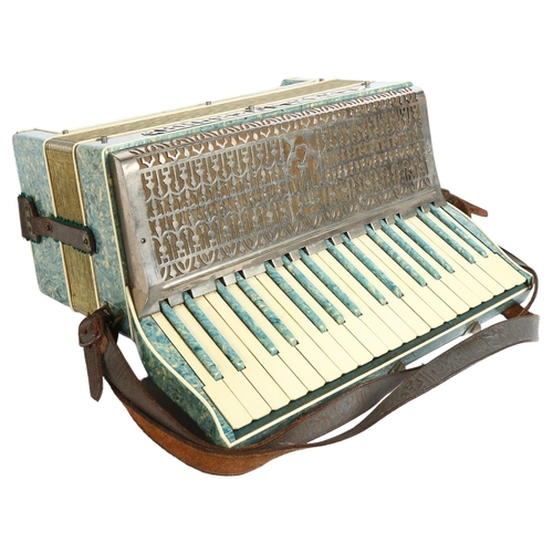 223 - CASALI VERONA - a Vintage piano accordion, in original leather case, with various associated music s... 