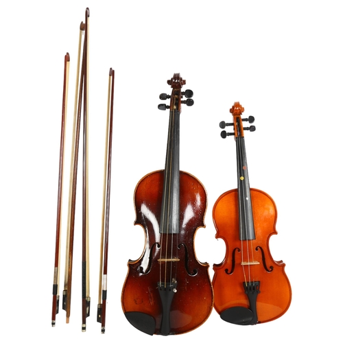 225 - A modern half-size violin, in associated hardshell casing with accompanying bows, and a full-size vi... 