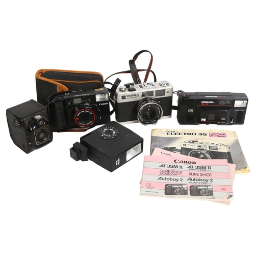 226 - A group of various Vintage cameras, including a Yashica Electro 35FC, a Miranda SL-X, and various ot... 