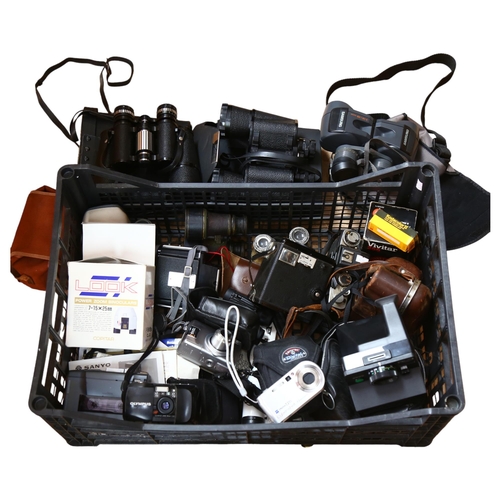 233 - A quantity of various Vintage cameras, binoculars, and other associated electrical equipment, includ... 