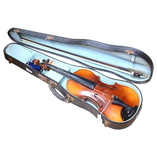 239 - A modern violin and bow, no labels, in hardshell case, L14