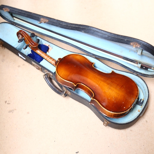 239 - A modern violin and bow, no labels, in hardshell case, L14