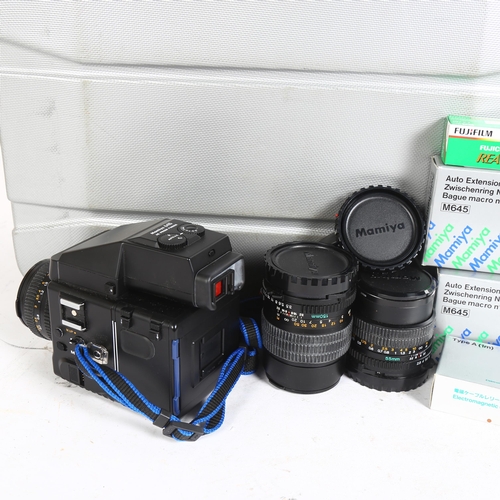 253 - Mamiya 645 Super with Mamiya Secor 80mm lens, and additional Mamiya Secor 55mm and 150mm lenses, and... 