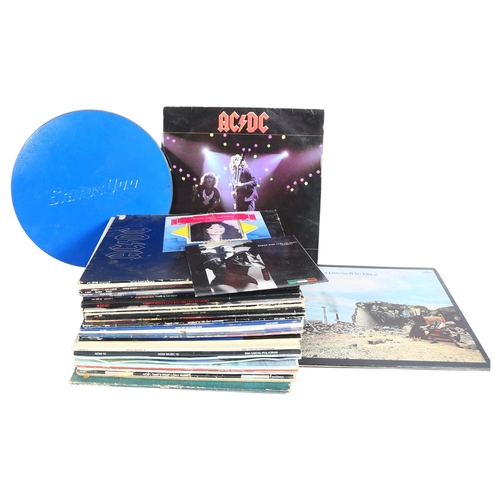 255 - A quantity of vinyl LPs, various artists including Rush, ACDC, Bryan Adams, Fleetwood Mac, Whitesnak... 