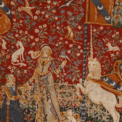 280 - A machine woven tapestry, on associated hanging rail, depicting a Medieval lady in woodland surround... 