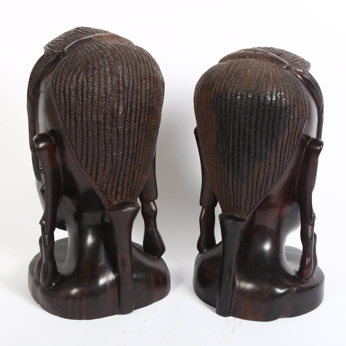 321 - 2 similar ebony carved wooden African heads, female form, H28cm (2)