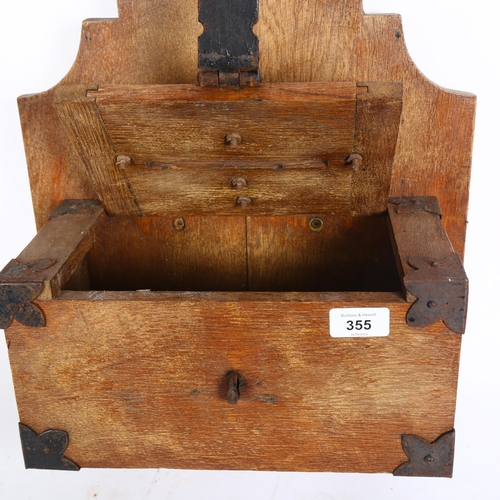 355 - A Gothic wooden church offering box, with iron fittings and lock, H55cm