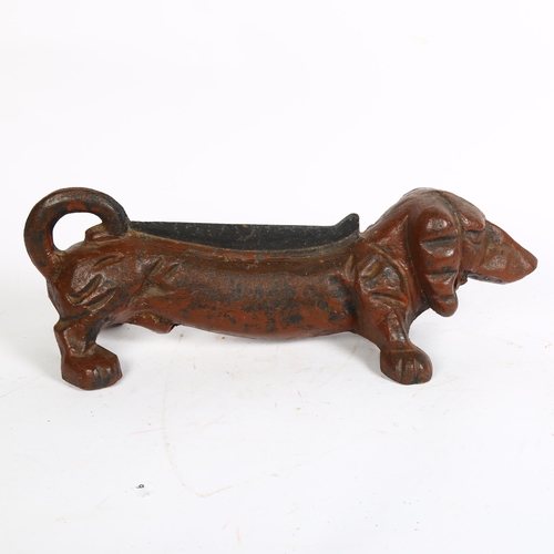 358 - A large iron Dachshund dog door stop, L42cm