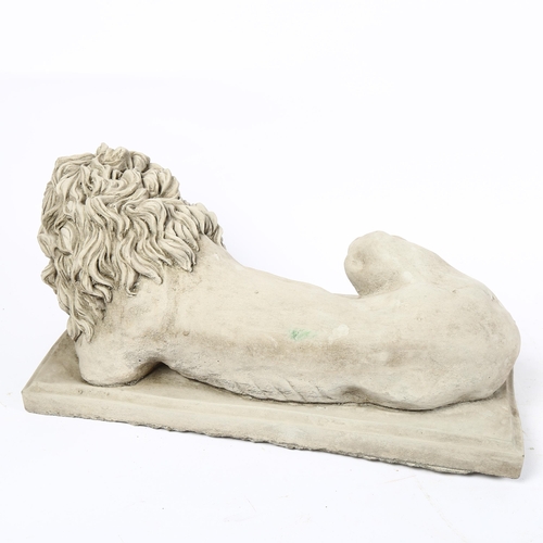 361 - A stone sculpture of a recumbent lion, L42cm