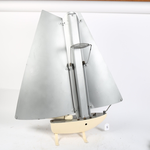 389 - A Vintage electric heater, modelled as a sailing boat with polished chrome sails (for re-wiring), H7... 