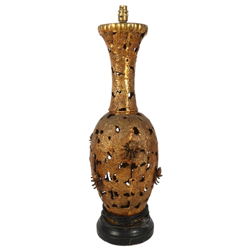 392 - An ornate gilt-metal table lamp, with floral decoration, H72cm