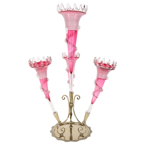 394 - A cranberry glass and silver plated table epergne, with 4 shaped trumpets, H58cm