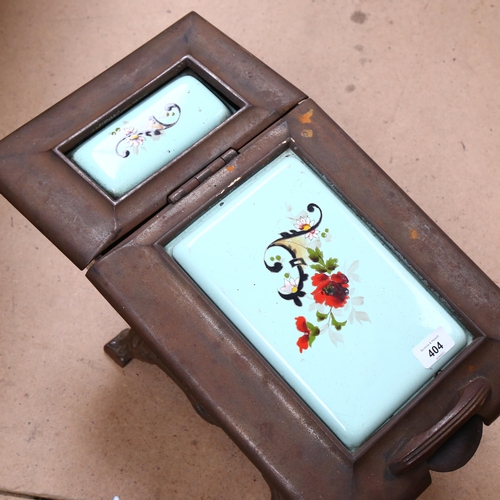 404 - A Victorian cast-iron coal bucket, with enamel inset to the lid, L50cm