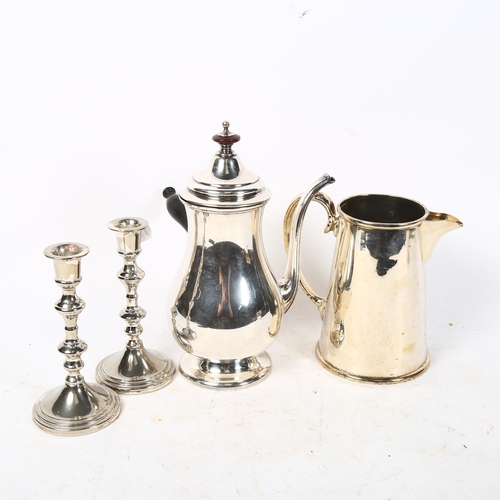 447 - A silver plated chocolate pot with turned wood handle, 24.5cm, a pair of candlesticks, and a hotel p... 