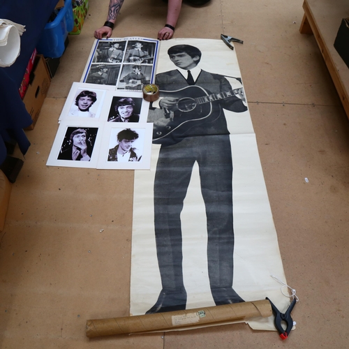 456 - A 1963 full length poster photo of George Harrison, published by Fan Fotos, with cardboard sleeve, a... 