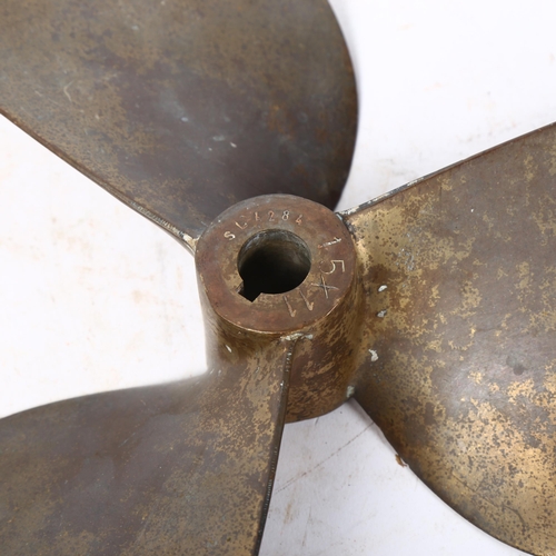 468 - A Vintage cast-brass propeller, inscribed 15X11, 34cm across