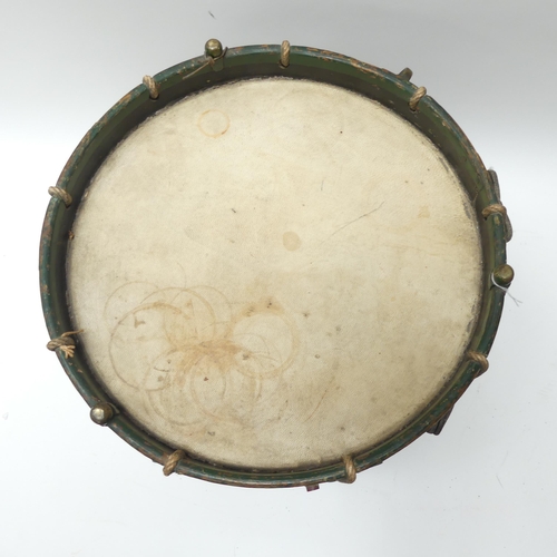 22 - A 20th century military drum, with brass body and painted wood mounts, H38cm, D37cm, and a pair of d... 