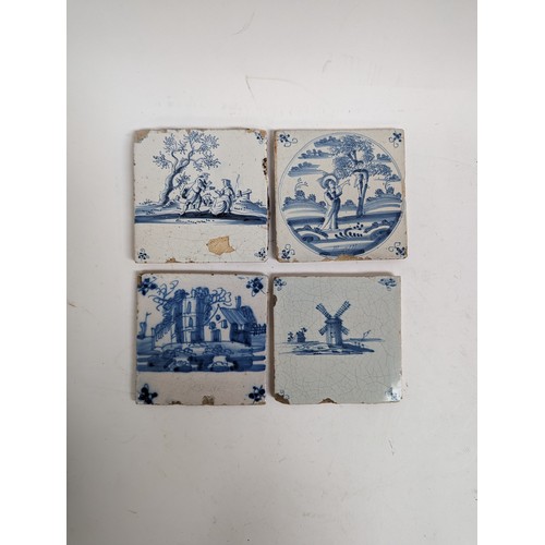 177 - A quantity of Delft blue and white tiles, there are 19 whole tiles, and a quantity of broken or inco... 