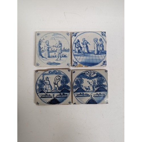 177 - A quantity of Delft blue and white tiles, there are 19 whole tiles, and a quantity of broken or inco... 