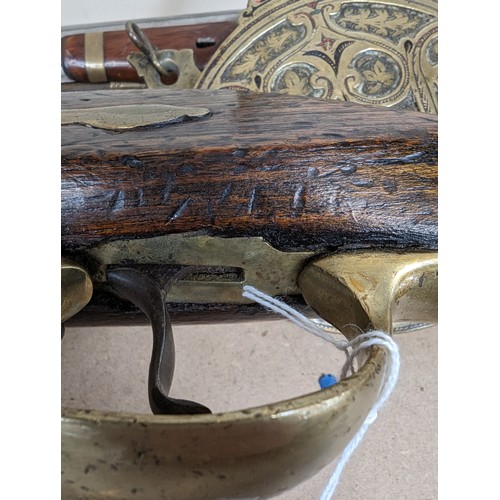 73 - *WITHDRAWN * DUBLIN CASTLE - an 18th/19th century rifle, barrel with GR and military cipher, L147cm,... 