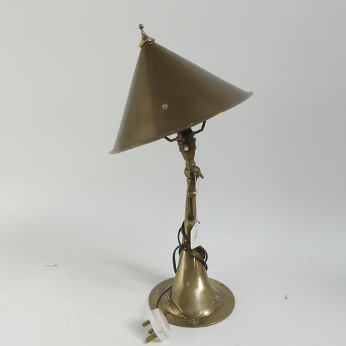 212 - JESSON, BIRKETT & CO - An Arts and Crafts brass table or wall lamp, circa 1905, with conical shade. ... 