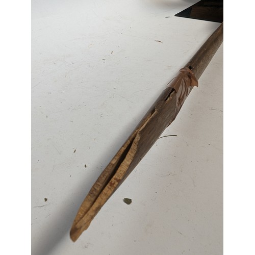 58 - An Indian Tulwar sword with wooden scabbard, blade length 87cm, overall length approx 100cm