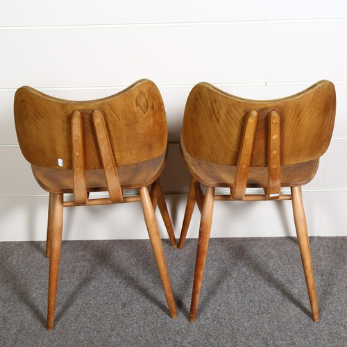 100 - Lucian Ercolani  for Ercol, 2 model 401 Butterfly dining chairs in beech and elm, height 77cm