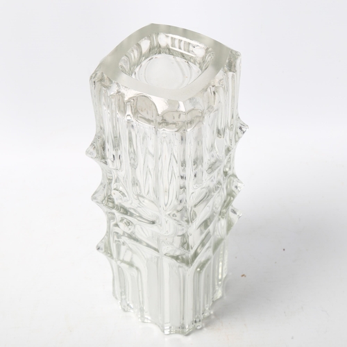 107 - A mid-century heavy walled geometric clear glass vase, height 24.5cm