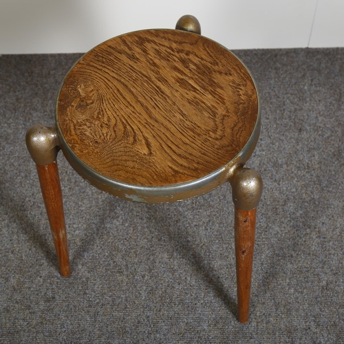 112 - Gerald Summers, a mid-century 3 legged stool with oak veneered cast metal seat, with maker’s marks, ... 